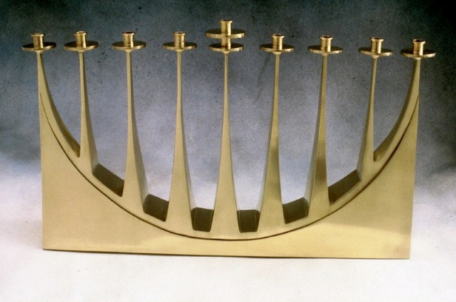 Hanukka Menorah. 1990. Brass. 14" x 9" x 2". Commissioned for Temple Sinai by M/M Howard Weinstein